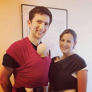 A couple using stretchy wraps
